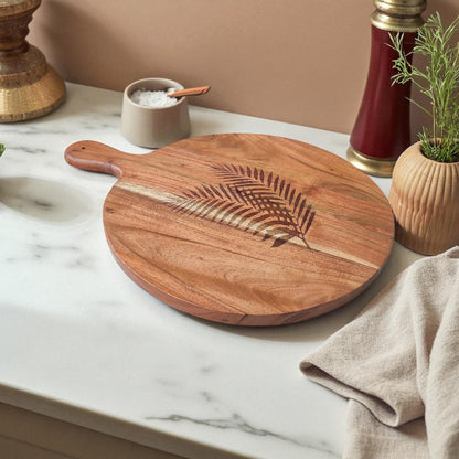 SacredFig Handcrafted Chopping Board | Round 16x12 Inch | Pine Leaf Carving