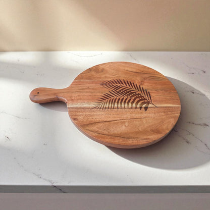 SacredFig Handcrafted Chopping Board | Round 16x12 Inch | Pine Leaf Carving