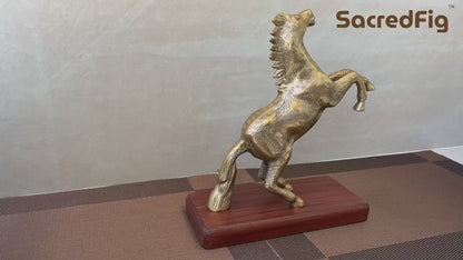 SacredFig Handcrafted Jumping Horse Metal Showpiece with Wooden Base – 9.5 In Golden Polish Decorative Figurine